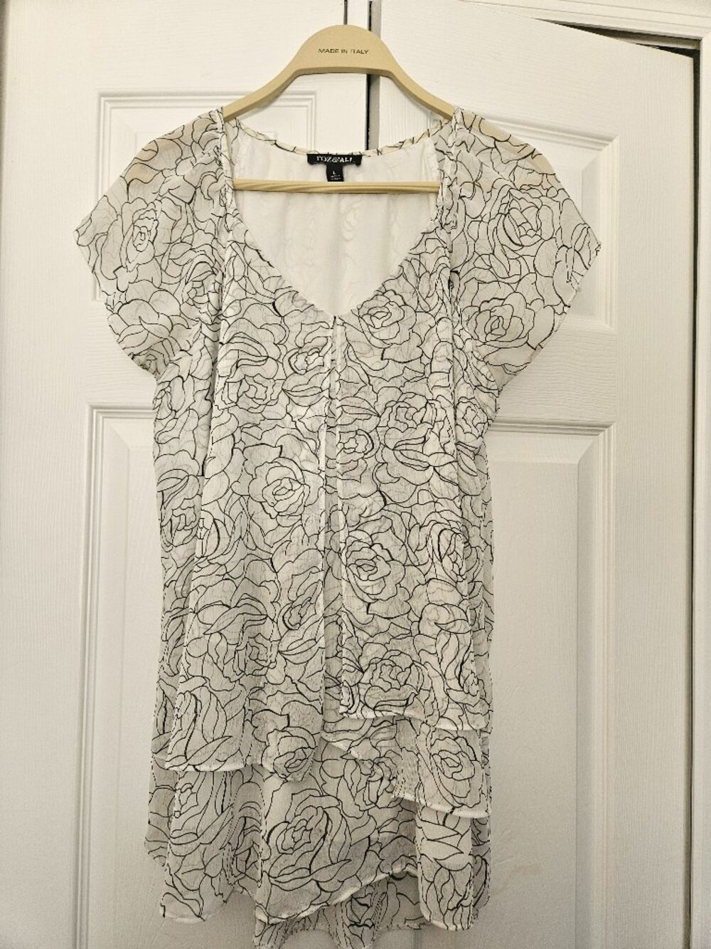 Layered Ruffled White Business Casual V-Neck Blouse with Black Floral Design